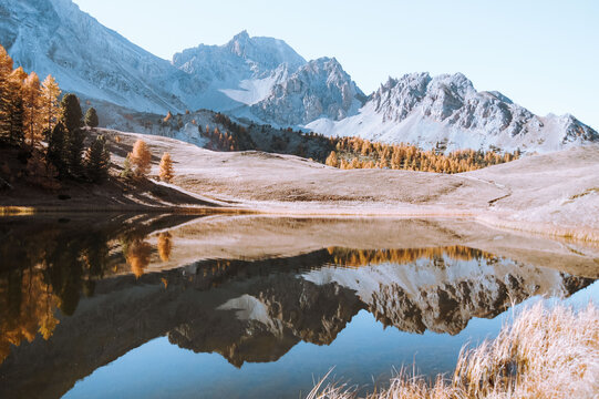 Mountains in fall with a lake and refletion