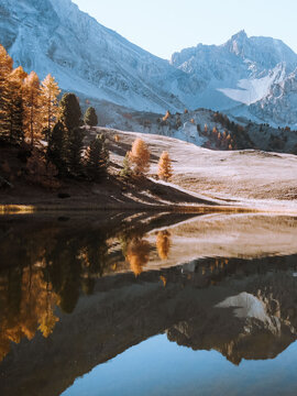 Mountains in fall with a lake and refletion