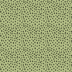 Trendy seamless pattern with crumbs on a green background. Abstract pattern for fashion fabrics, home decor, backdrops, cards, template, scrapbooking and more.
