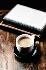 Cup of coffee on wooden background. Close up.	