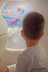 Little boy looking out of window while flying on an airplane.Elephant flying with air balloons with sky and clouds background. Fantastic surreal fantasy illustration. Freedom concept - 583627020