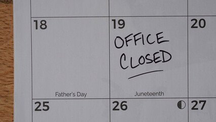 Office Closed marked on a calendar in observance of the Juneteenth holiday. Juneteenth is a federal...