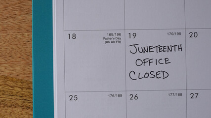 Office Closed marked on a calendar in observance of the Juneteenth holiday. Juneteenth is a federal holiday in the United States commemorating the emancipation of enslaved African Americans