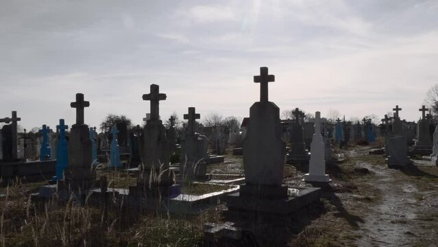 old cemetery with stone crosses