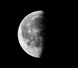 The waning gibbous moon glows softly in the night sky, its gentle radiance casting a peaceful...