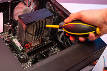 Dirty cooler ventilation system unit computer, cleaning from dust.