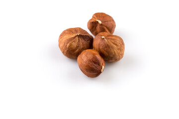 Hazelnuts on the white background