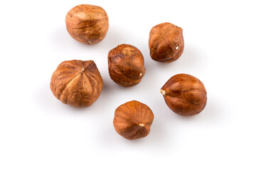 Hazelnuts on the white background