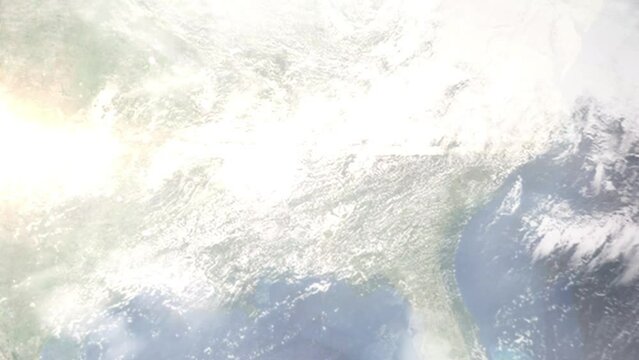 Earth zoom in from outer space to city. Zooming on Center Point, Alabama, USA. The animation continues by zoom out through clouds and atmosphere into space. Images from NASA