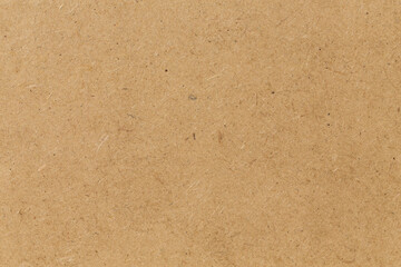 Pressed beige chipboard texture.