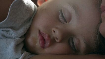 One small boy sleeping. Macro close up of child asleep. Kid napping with eyes closed