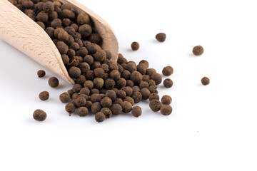 Wooden shovel with black peppercorn