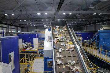 conveyors with waste at the plant for their processing