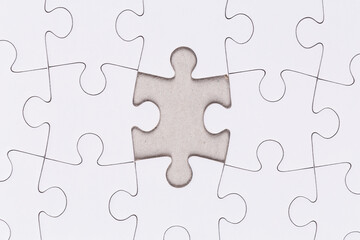 Fototapeta premium white puzzle jigsaw close up