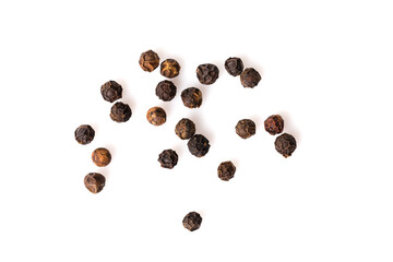Black pepper seeds on white