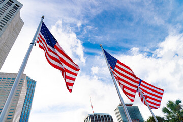 american flag outdoor. american flag outside. american flag at flagpole. photo of american flag