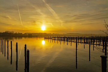 Obraz premium view over Chiemsee lake in sunset