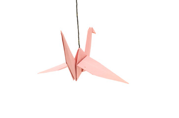 A flying paper crane hanged