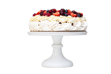 Meringue Pavlova cake with whipped cream and fresh berries isolated, strawberries and blueberries on white background. Horizontal orientation