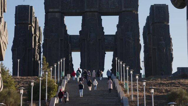 Some of the 16 sixteen large columns of the Georgian Stonehenge. Action. Giant monument, concept of architecture and history.