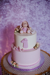 A beautiful two-tier holiday cake for a girl on her 1st birthday