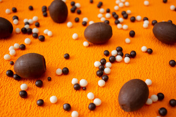 chocolate balls on an orange background