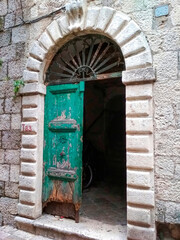 Fototapeta na wymiar Photo of the entrance door of an old building