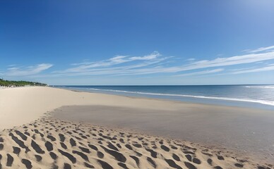 Fototapeta na wymiar Empty beach with blue water sky and clouds