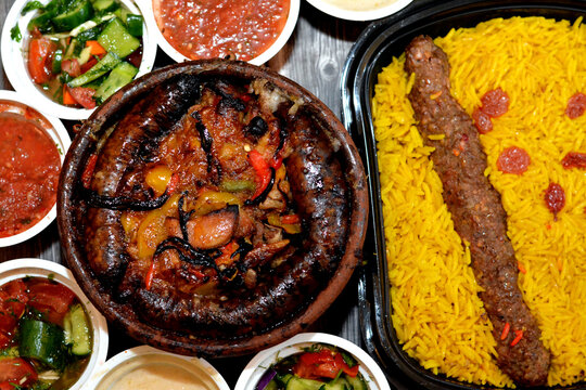 Traditional Egypt beef  Kofta, kebab and tarb kofta shish with mixture of lamb meat, sausage mumbar intestines filled with rice, kawareh trotters cow feet, pieces of cooked kidneys, heart, testicles