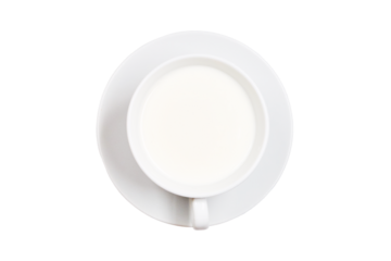 White cup with milk on a saucer, isolated on a white background