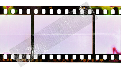 strange 35mm filmstrip isolated with developing smear marks fixed by single transparent...