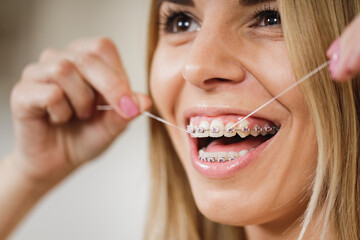 Cleaning Teeth With Dental Floss