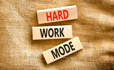Hard work mode symbol. Concept words Hard work mode on wooden block on a beautiful canvas table canvas background. Business and Hard work mode concept. Copy space.