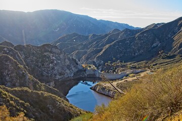 Fototapeta na wymiar Big Tujunga Dam creates the Big Tujunga Reservoir resevoir in the San Gabriel Mountains just north of Los Angeles