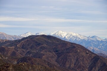 Fototapeta na wymiar Snow dusts the San Gabriel Mountains that rise above Greater Los Angeles