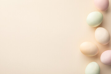 A pastel colored easter eggs with copy space in light tones