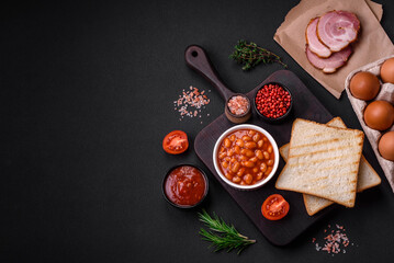 Delicious canned beans in a tomato in a white ceramic bowl