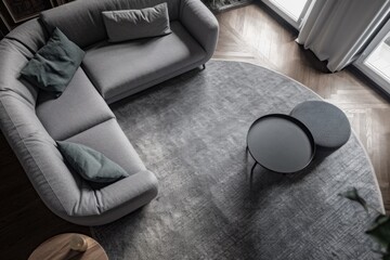 Modern grey soft sofa and carpet on hardwood floor from above. Homeyness. Apartment info. Hotel decor. Trendy sofa. Generative AI