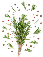 Rosemary branches tied with rope, aromatic pepper, black and red pepper on a white isolated background, culinary spices