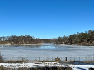 Beautiful winter lake with frozen ice taken outside of Stockholm, Sweden.