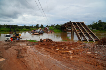 Collapsed bridge in Brazil of highway BR 319 over the Rio Curuca, A bridge pier was not anchored deep enough in the ground during construction and snapped off years later. Near Autazes, Amazonas.