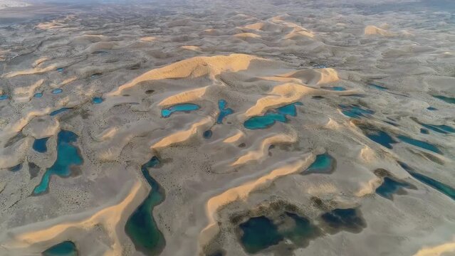 Aerial view of water formations after spring rains in the Sahara Desert, Algeria.