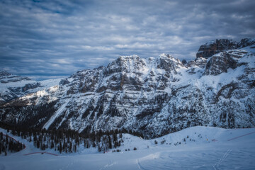 Fototapeta na wymiar Famous Italian Alps Brenta Dolomites, snow on the slopes of the Alps Madonna di Campiglio, Pinzolo, Italy. Ski resorts in Italy. January 2023
