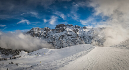 A beautiful view of Brenta Dolomites with fantastic clouds and Alps Madonna di Campiglio, Pinzolo, Italy. January 2023
