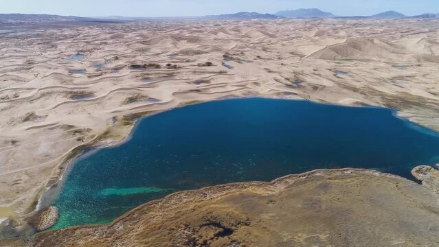 Aerial view of water formations after spring rains in the Sahara Desert, Algeria.