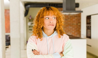 young red hair latin pretty womann at new cool home