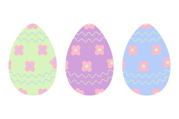 Set of three Easter eggs in trendy soft green, lilac and blue with pattern of wavy lines and flowers