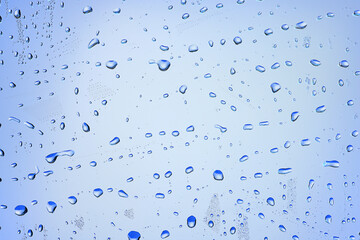 drops glass blue background abstract, transparent cold background water splashes