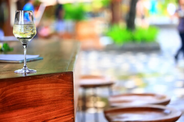 white wine tasting, chilled ice wine in a cold glass in summer