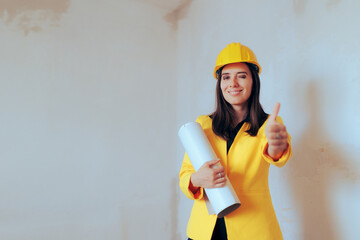 Happy Construction Engineer Making Thumbs up Gesture Holding Blueprints. Architect standing on a...
